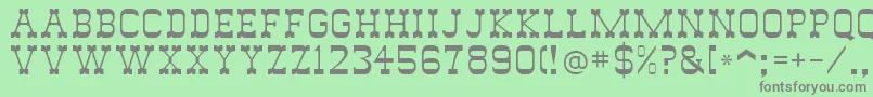 SlimmerPickensSsi Font – Gray Fonts on Green Background