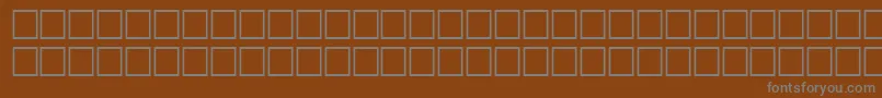 Шрифт FauvismRegular – серые шрифты на коричневом фоне