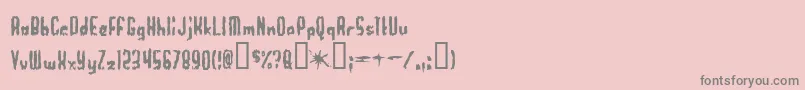 フォントWorthles – ピンクの背景に灰色の文字