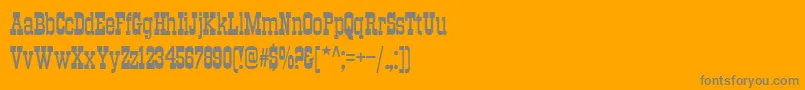 Traktirc-Schriftart – Graue Schriften auf orangefarbenem Hintergrund