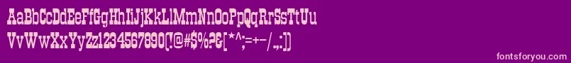 Traktirc Font – Pink Fonts on Purple Background
