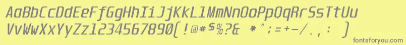 フォントUnispaceItalic – 黄色の背景に灰色の文字