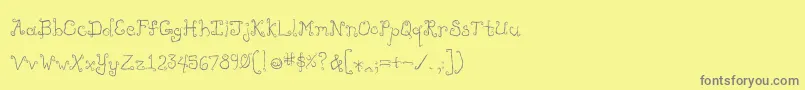 フォントLikecockatoos – 黄色の背景に灰色の文字