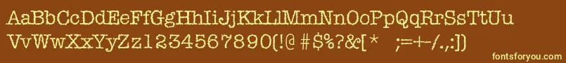 Misticac-fontti – keltaiset fontit ruskealla taustalla