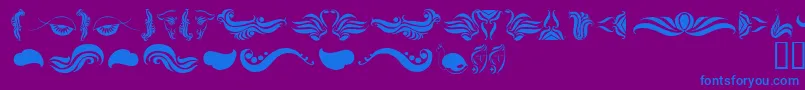 AbsinthFlourishesI Font – Blue Fonts on Purple Background