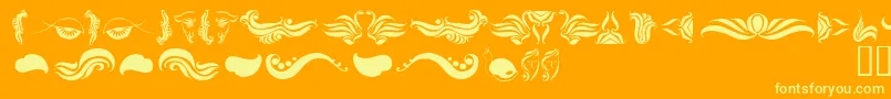 AbsinthFlourishesI Font – Yellow Fonts on Orange Background