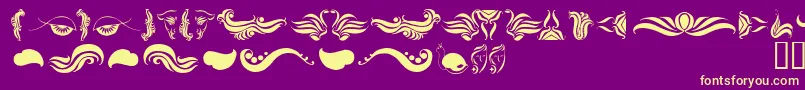 AbsinthFlourishesI Font – Yellow Fonts on Purple Background