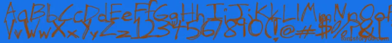 TheHandOfTes Font – Brown Fonts on Blue Background