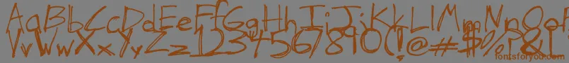 TheHandOfTes Font – Brown Fonts on Gray Background
