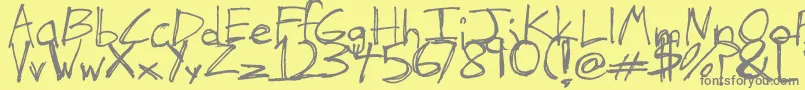 TheHandOfTes-Schriftart – Graue Schriften auf gelbem Hintergrund