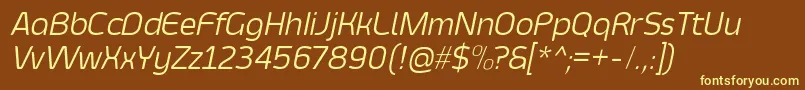 SmoolthanThinItalic-fontti – keltaiset fontit ruskealla taustalla