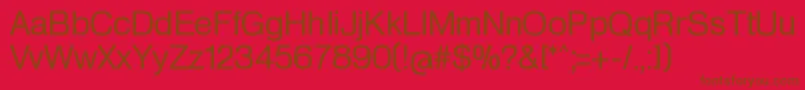 HeldustryftRegular-Schriftart – Braune Schriften auf rotem Hintergrund