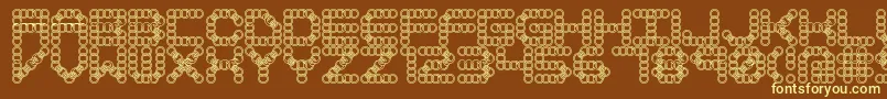 LynxBrk-fontti – keltaiset fontit ruskealla taustalla