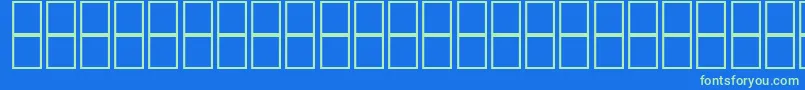 McsHor8SUNormal2000 Font – Green Fonts on Blue Background