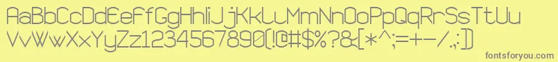 SemiRoundedSansSerif7-fontti – harmaat kirjasimet keltaisella taustalla