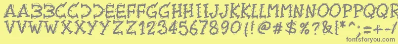 フォントPwtwirly – 黄色の背景に灰色の文字