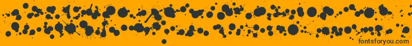 WcRhesusBBta-Schriftart – Schwarze Schriften auf orangefarbenem Hintergrund