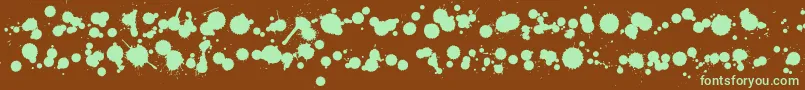 Czcionka WcRhesusBBta – zielone czcionki na brązowym tle