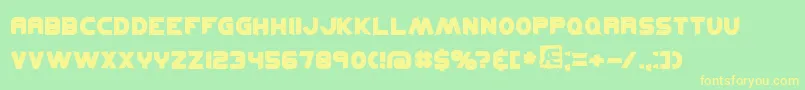 KickflipBrk-Schriftart – Gelbe Schriften auf grünem Hintergrund