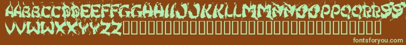 フォントHongkff – 緑色の文字が茶色の背景にあります。