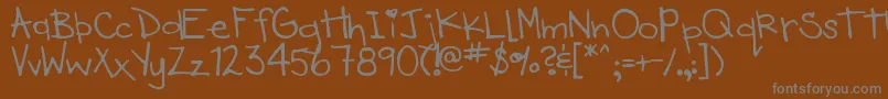 フォントDjbHeartOfDixi – 茶色の背景に灰色の文字