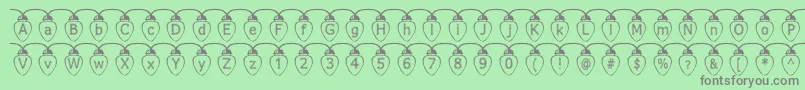 Fonte Fuzzxl – fontes cinzas em um fundo verde
