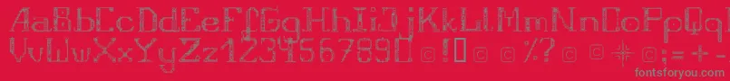 フォントFragileRegular12 – 赤い背景に灰色の文字