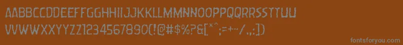 Wormcuisinelight Font – Gray Fonts on Brown Background