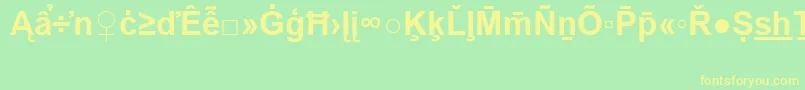 フォントArialSpecialG2Bold – 黄色の文字が緑の背景にあります