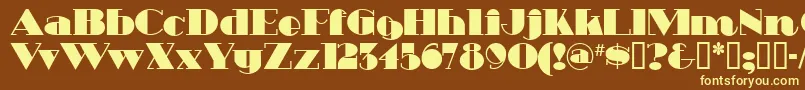 HeavytrippUltrabold-fontti – keltaiset fontit ruskealla taustalla
