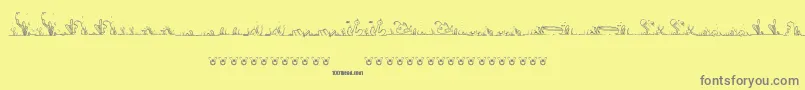 フォントLalineaSea – 黄色の背景に灰色の文字