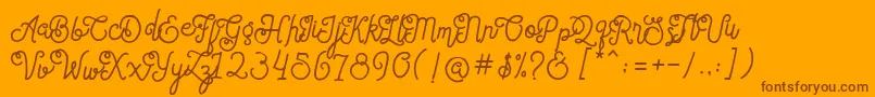SortdecaiCursiveWildScriptFree-Schriftart – Braune Schriften auf orangefarbenem Hintergrund