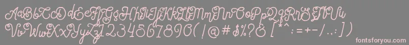 フォントSortdecaiCursiveWildScriptFree – 灰色の背景にピンクのフォント