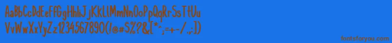 KomixconBold Font – Brown Fonts on Blue Background