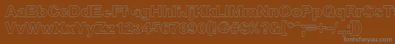 CyrveticaExtraOutline-fontti – harmaat kirjasimet ruskealla taustalla