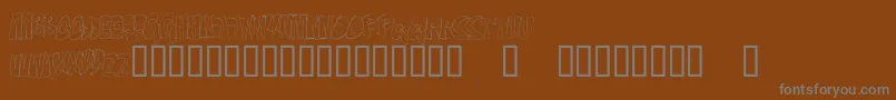 OnTheEdge Font – Gray Fonts on Brown Background