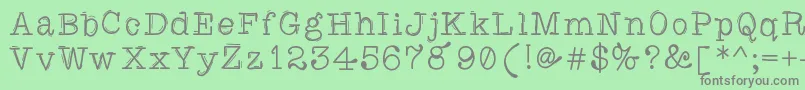 Caretodance Font – Gray Fonts on Green Background