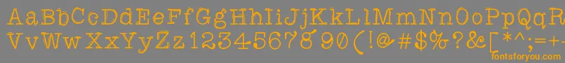 Caretodance Font – Orange Fonts on Gray Background
