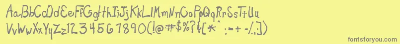 Newtoy ffy Font – Gray Fonts on Yellow Background