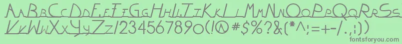 WiltonianRegular Font – Gray Fonts on Green Background