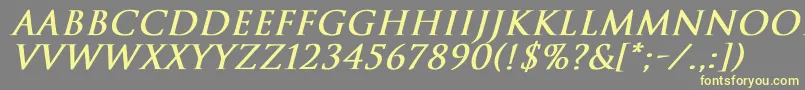 TrajanNormalBoldItalic Font – Yellow Fonts on Gray Background
