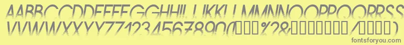 Amsti-fontti – harmaat kirjasimet keltaisella taustalla