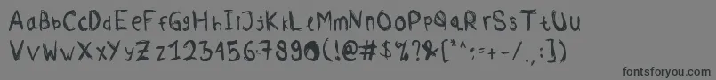 フォントComodorepaper – 黒い文字の灰色の背景