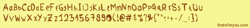 Comodorepaper Font – Brown Fonts on Yellow Background