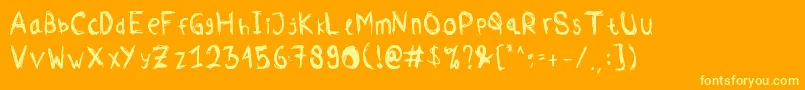 Comodorepaper Font – Yellow Fonts on Orange Background