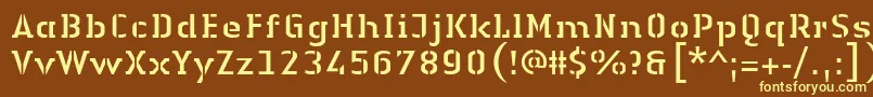 LinotypeAuthenticStencilRegular-fontti – keltaiset fontit ruskealla taustalla