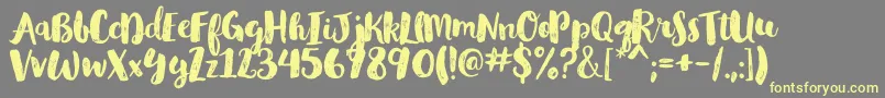 GlamourbrushRegular Font – Yellow Fonts on Gray Background