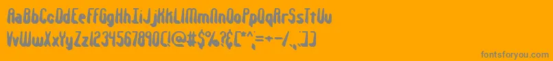 Withstan-fontti – harmaat kirjasimet oranssilla taustalla