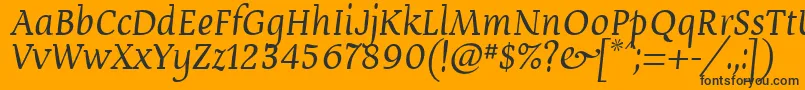 Czcionka Devroyun – czarne czcionki na pomarańczowym tle