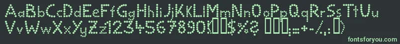 Ballbold Font – Green Fonts on Black Background